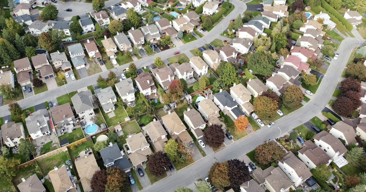 Aerial view of a neighborhood of similar homes